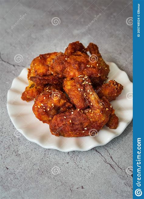 Deep Fried Chicken Wing With Hot And Spicy Sauce In Korean Style Or Asian Food Concept Stock