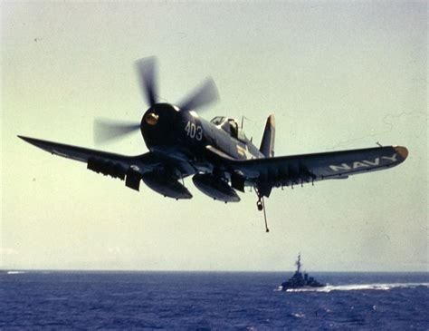 Asisbiz Vought F4U 4 Corsair VF 74 White L403 Landing CVA 20 USS