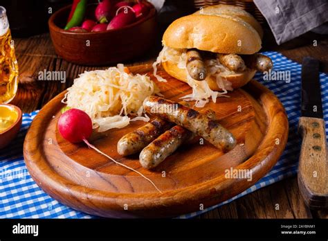 Rustic N Rnberger Bratwurst With Sauerkraut And Roll Stock Photo Alamy