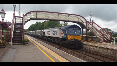 CEMEX Liveried 66780 On A Tarmac Service 6M31 Hunslet Arcow Passing