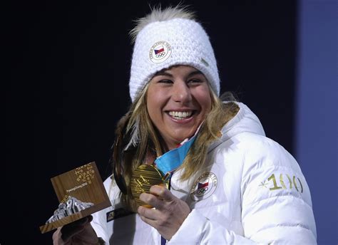 Ester Ledecka wins snowboarding gold, becoming first Olympian to win in both snowboarding and ...