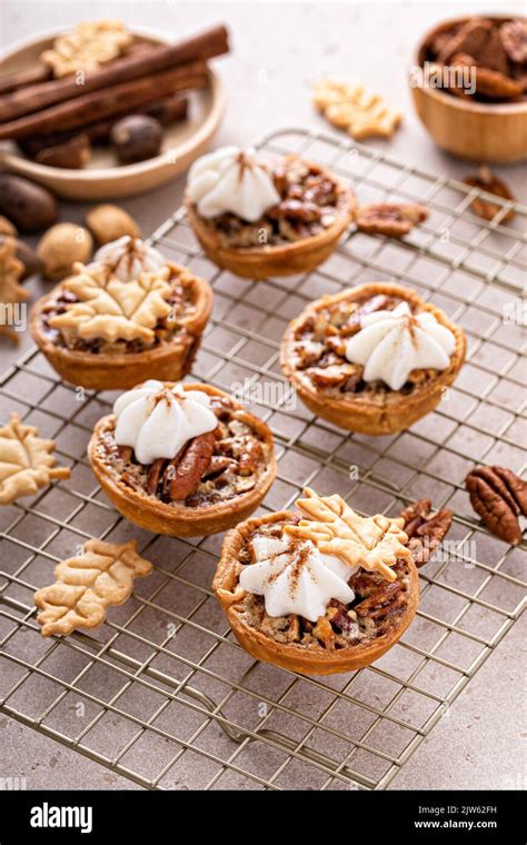 Mini Pecan Pies Baked In A Muffin Tin Stock Photo Alamy