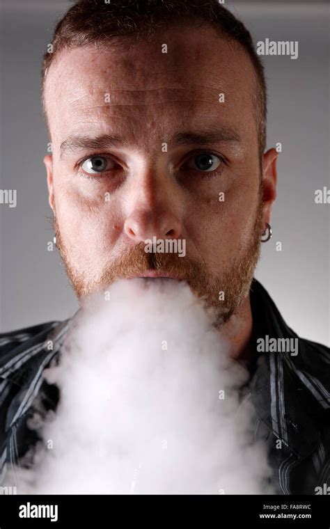 Blowing Smoke Hi Res Stock Photography And Images Alamy