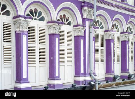Purple Building Walls In Singapore Chinatown With Traditional Wooden