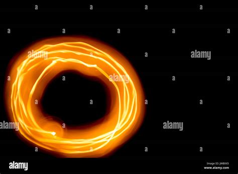 Glowing Bright Orange Circle Darkness Stock Photo Alamy