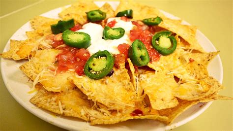 Super Cheesy Nachos With Images Cheesy Nachos Easy Meals Recipes