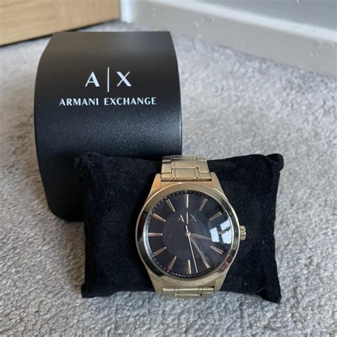 Armani Exchange Men's Gold and Black Watch | Depop