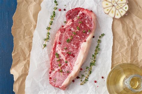 Premium Photo Big Whole Piece Of Raw Beef Meat Striploin On White