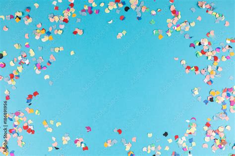 blue background frame with confetti Stock Photo | Adobe Stock