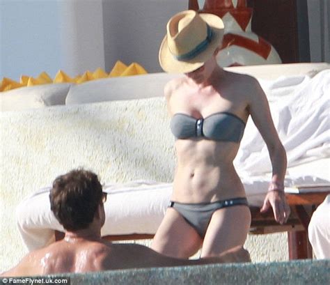 Diane Kruger Shows Off Her Washboard Abs In A Strapless Bikini With Joshua Jackson Daily Mail