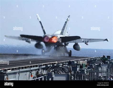 US Navy An F A 18 Hornet Launches From One Of Four Steam Powered