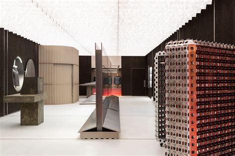 OMA / AMO creates stone-like interiors for Stone Island to emphasize ...