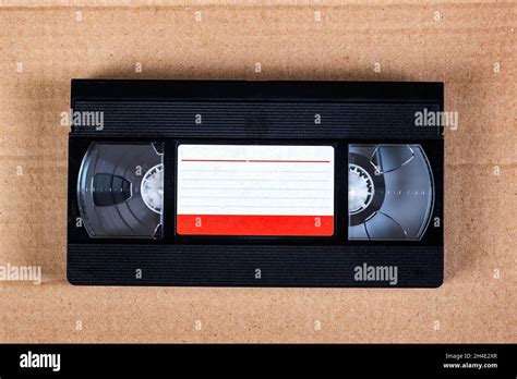 Retro Video Tape Cassette On The Cardboard Background Closeup Stock