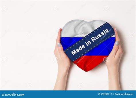 Inscription Made In Russia The Flag Of Russia Female Hands Holding A