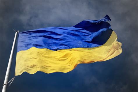 Ukraine Flag In Cloudy Sky Large Yellow Blue State Ukrainian Flag