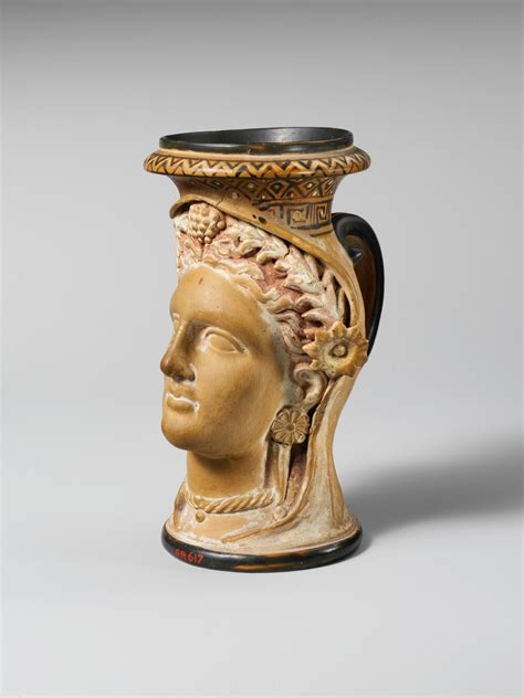 Terracotta Oinochoe Jug In The Form Of A Womans Head Etruscan