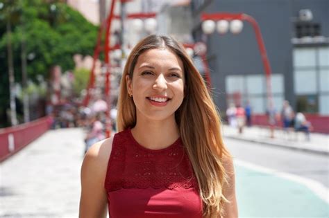 Premium Photo | Closeup of beautiful woman walking in Sao Paulo neighborhood Liberdade Brazil ...