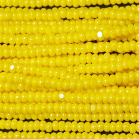 13 0 Czech Charlotte Cut Seed Bead Opaque Corn Yellow AB Garden Of