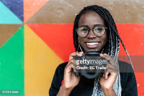 Portrait Of A Photographer Smiling With Colorful Background High-Res Stock Photo - Getty Images