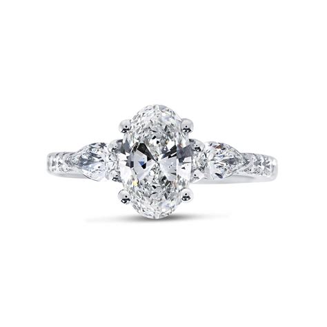 Oval Shape Diamond Halo Engagement Ring Reve Diamonds