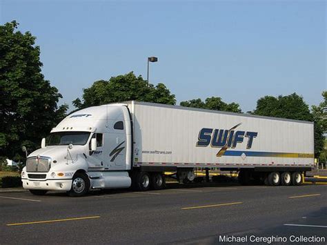 Swift Transportation Kenworth T With A Tri Axle Reefer Belonging