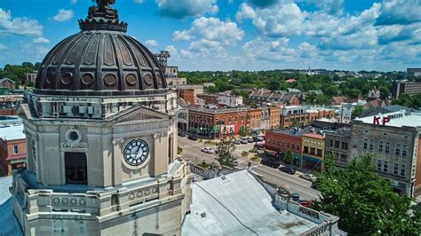 Up Close To Top of Bloomington Indiana Courthouse Clock with Downtown ...