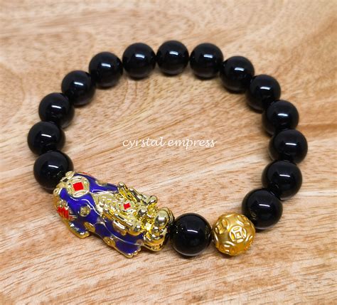 Black Onyx With Color Changing Pi Yao Lucky Coin Ball Bracelet