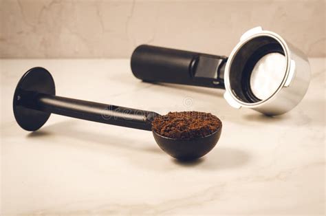 Spoon With Ground Coffee And Holderblack Spoon With Ground Coffee And
