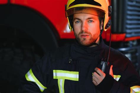 Premium Photo Photo Of Fireman With Gas Mask And Helmet Near Fire Engine