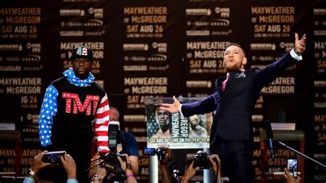 Conor McGregor and Floyd Mayweather Face Off for the First Time | GQ