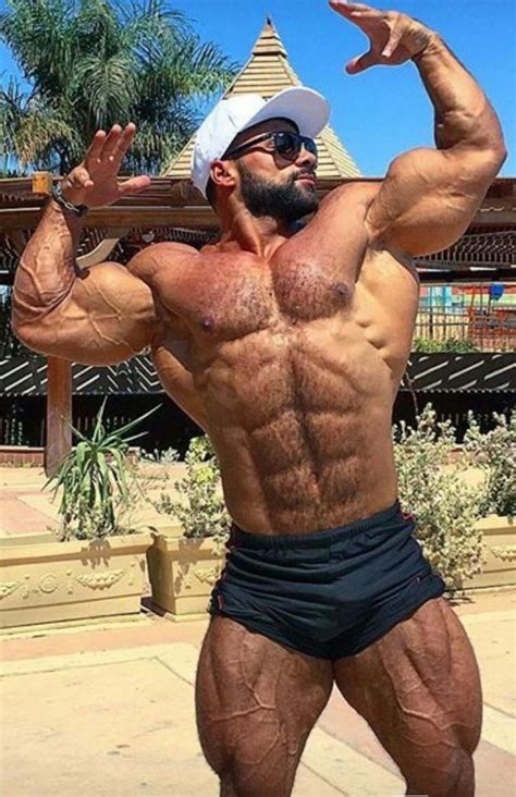 Flexing His Huge Hairy Pecs And Massive Arms Outdoors Can T Get