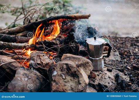 Cooking Breakfast On A Campfire At A Summer Camp Stock Photo Image