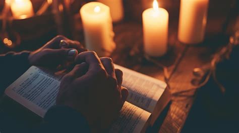 Premium Photo Hands Folded In Prayer On A Holy Bible In Church