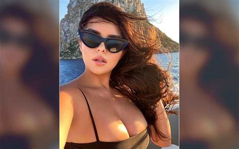 Demi Rose Poses SEMI NUDE As She Puts Her Eye Popping Ample Assets On