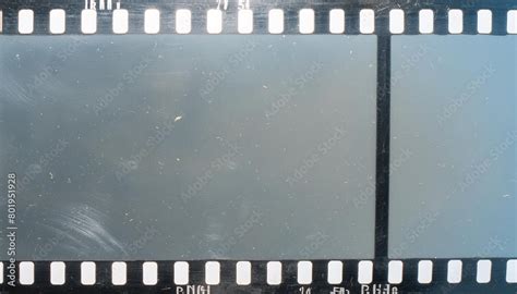 Dusty and grungy 35mm film texture material or surface. Dust particle ...