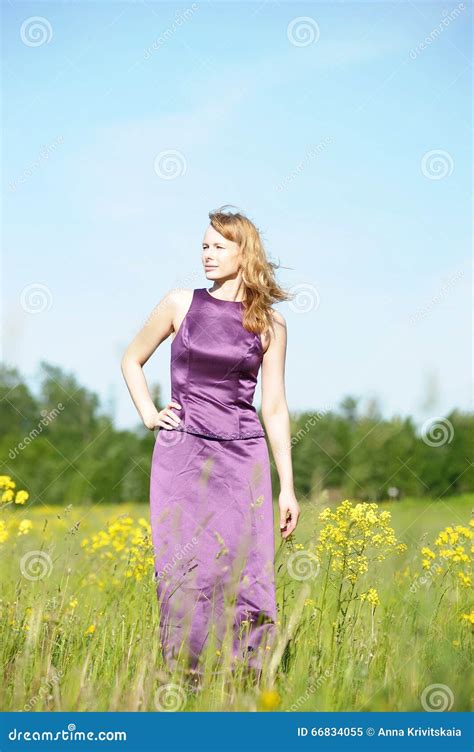 Portrait Of The Blonde With A Purple Dress Stock Image Image Of Girl Clouds 66834055