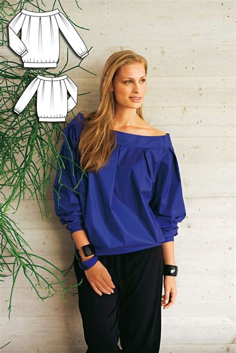 The Hip Length Blouse Features A Wide Waistband And Pleats That Is Both