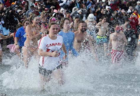 People All Over The World Participate In Polar Bear Plunges Across The