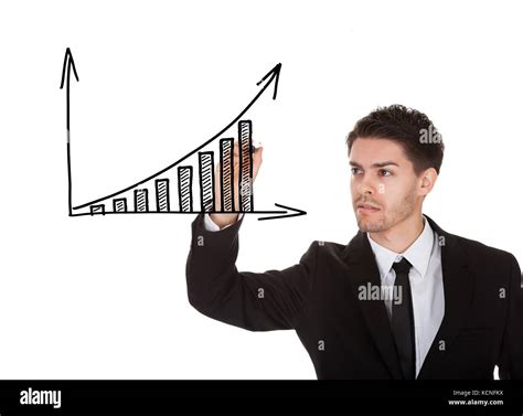 Man Holding Marker Writing Profit Growth Chart On White Screen Stock