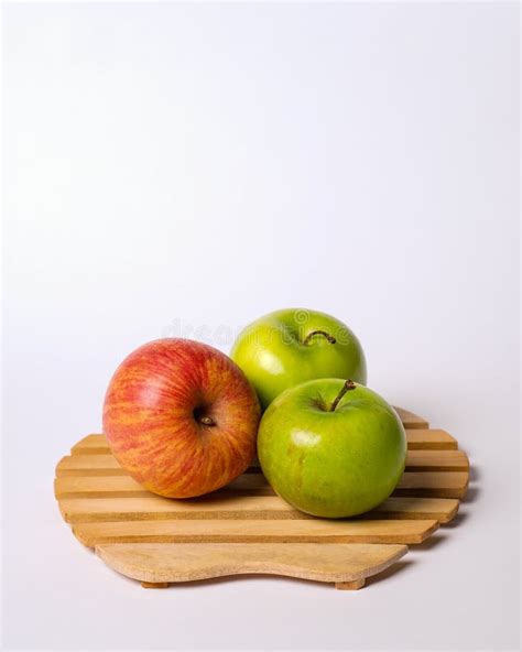 Two Green Apples And One Red Apple Isolated On White Background Stock