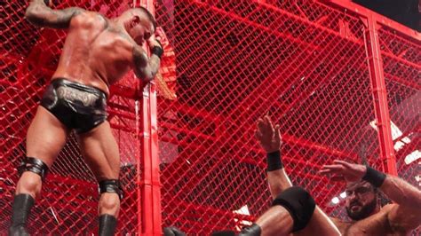 Randy Orton Pushes Drew McIntyre Off Hell In A Cell Onto The Announce