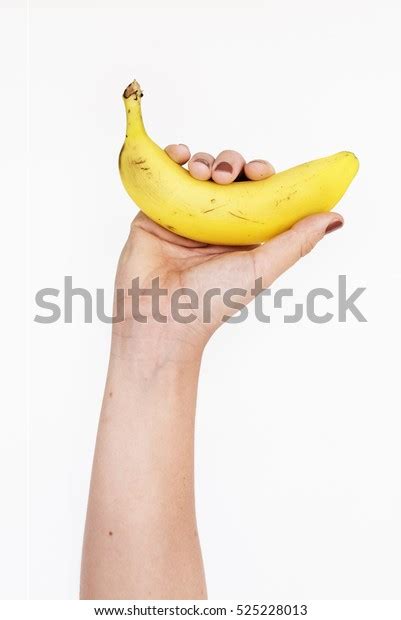 Human Hand Holding Banana Fruit Nutrition Stock Photo 525228013