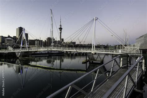 auckland skyline   viaduct harbour   pedestrian bridge