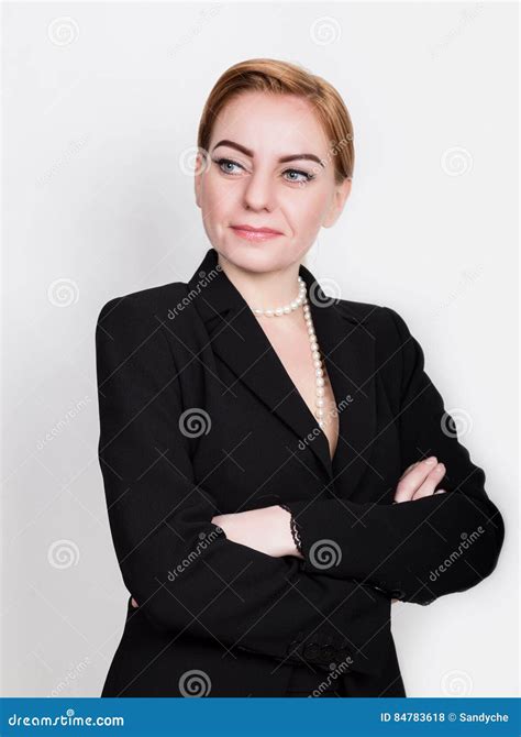 Attractive And Energetic Business Woma In A Suit On Naked Body Smiling