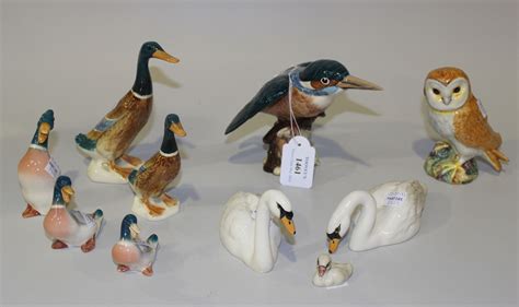 A collection of ten Beswick birds, comprising Barn Owl, No. 1046A ...