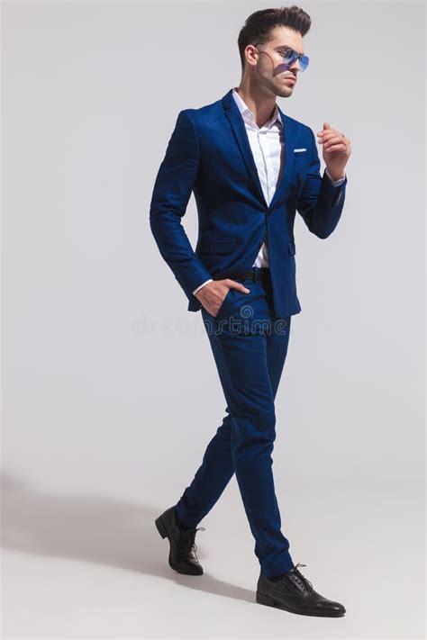 Side View Of A Fashion Elegant Man In Suit Walking Stock Photo Image