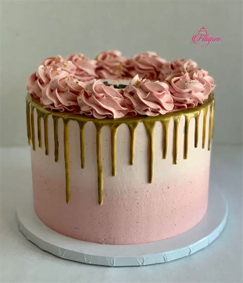 Pink And Gold Drip Cake With Rosettes