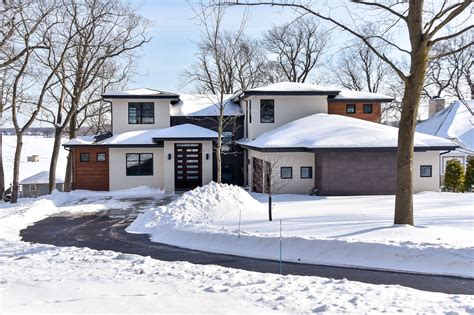 Front View Of The Contemporary Pewaukee Lake House Built By Ware Design