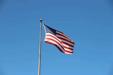 Free Stock Photo Of Flapping American Flag On Pole