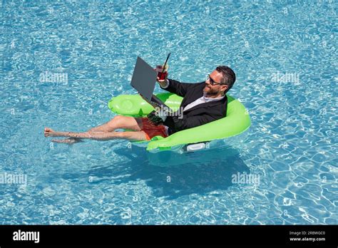 Handsome Man Floating In Pool Hi Res Stock Photography And Images Alamy